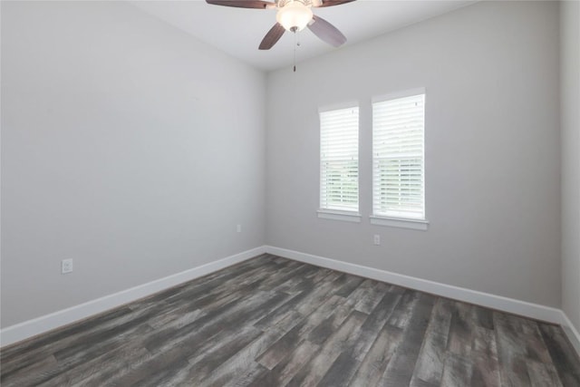 204 Hopping Peach St, San Marcos, TX 78666 - spare room featuring baseboards, dark wood-style floors, and ceiling fan
