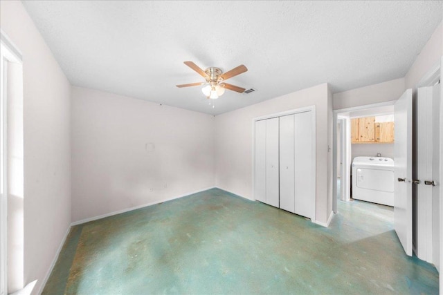 1015 E Yager Ln Unit 187, Austin, TX 78753 - unfurnished bedroom with washer / clothes dryer, finished concrete floors, a closet, baseboards, and a ceiling fan