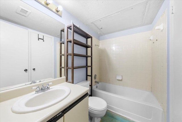 1015 E Yager Ln Unit 187, Austin, TX 78753 - full bathroom featuring toilet, vanity, bathtub / shower combination, and a textured ceiling