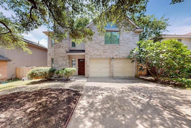 1115 Byers Ln, Austin, TX 78753 - traditional-style home with brick siding, concrete driveway, and a garage