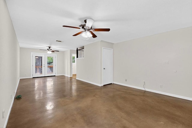 1115 Byers Ln, Austin, TX 78753 - unfurnished living room featuring a ceiling fan, concrete floors, and baseboards