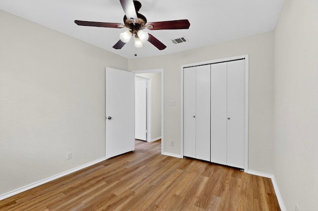 1115 Byers Ln, Austin, TX 78753 - unfurnished bedroom featuring light wood-type flooring, baseboards, a closet, and ceiling fan