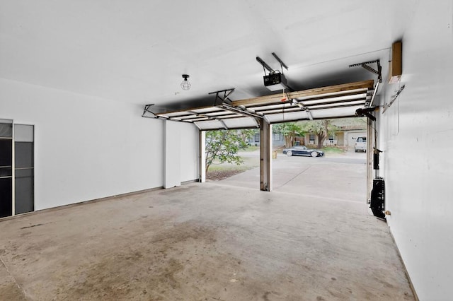 1115 Byers Ln, Austin, TX 78753 - garage featuring a garage door opener