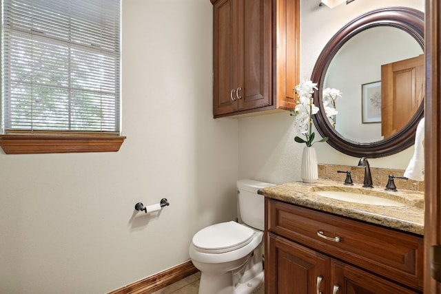 3 Hillview Dr, Round Rock, TX 78664 - half bath featuring toilet, vanity, baseboards, and tile patterned floors