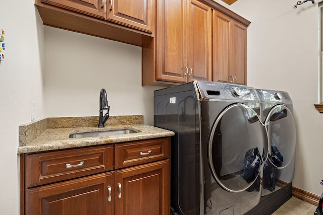 3 Hillview Dr, Round Rock, TX 78664 - laundry room featuring cabinet space, washing machine and dryer, and light tile patterned floors
