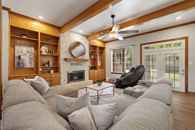 3 Hillview Dr, Round Rock, TX 78664 - living area with baseboards, healthy amount of natural light, beamed ceiling, wood finished floors, and recessed lighting