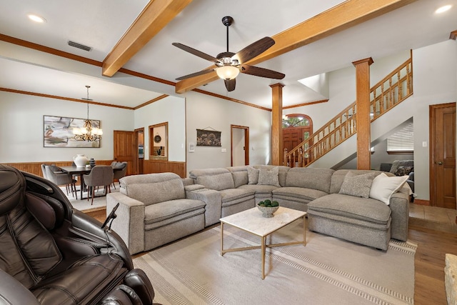 3 Hillview Dr, Round Rock, TX 78664 - living area featuring a chandelier, wood finished floors, ceiling fan, beam ceiling, and stairway