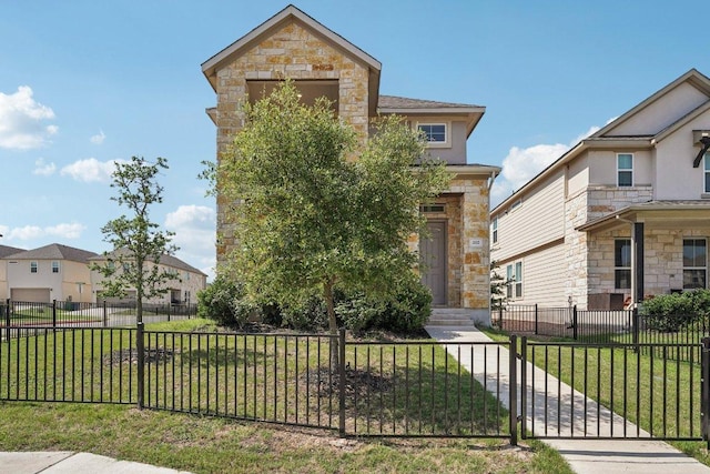 202 Delaware Mountains Ter, Dripping Springs, TX 78620 - view of front of property with stone siding and a gate