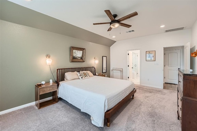 12904 Cerro Castellan Trce, Manor, TX 78653 - carpeted bedroom featuring baseboards, recessed lighting, ensuite bathroom, lofted ceiling, and ceiling fan