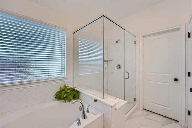 12904 Cerro Castellan Trce, Manor, TX 78653 - bathroom with a bath, a stall shower, and marble look tile flooring
