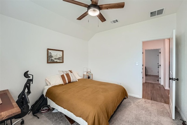 12904 Cerro Castellan Trce, Manor, TX 78653 - carpeted bedroom with lofted ceiling, a ceiling fan, and baseboards