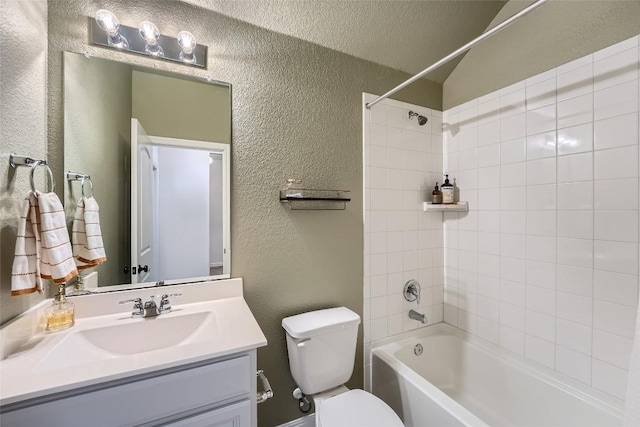 12904 Cerro Castellan Trce, Manor, TX 78653 - full bathroom featuring a textured wall, toilet, vanity, and shower / bathtub combination