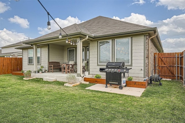 12904 Cerro Castellan Trce, Manor, TX 78653 - back of property with a patio and roof with shingles