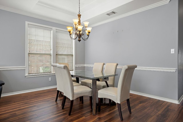123 Justin Leonard Dr, Round Rock, TX 78664 - dining area featuring a chandelier, wood finished floors, crown molding, and baseboards