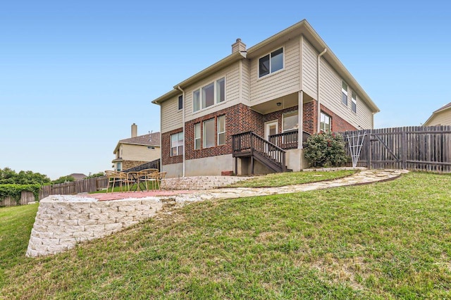 4508 Three Arrows Ct, Cedar Park, TX 78613 - back of house featuring brick siding and a chimney