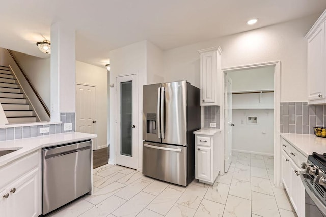 4508 Three Arrows Ct, Cedar Park, TX 78613 - kitchen with appliances with stainless steel finishes, light marble finish flooring, light countertops, and recessed lighting