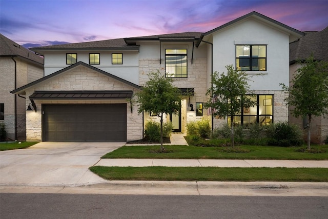 17804 Hattie Trce, Austin, TX 78738 - view of front of property with stone siding, concrete driveway, stucco siding, and a garage