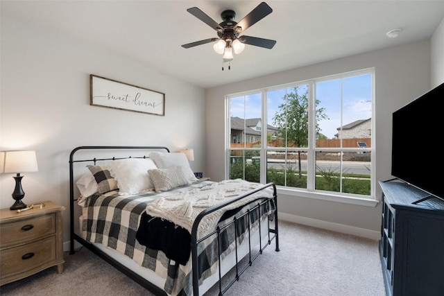 17804 Hattie Trce, Austin, TX 78738 - bedroom with light colored carpet, baseboards, and ceiling fan