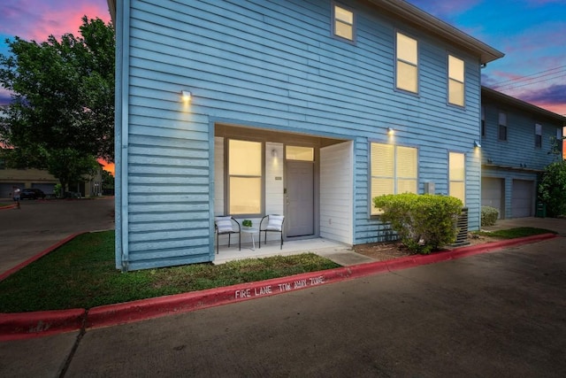 1201 Grove Blvd Unit 1103, Austin, TX 78741 - view of front of home with a garage and a porch