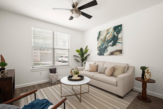 1201 Grove Blvd Unit 1103, Austin, TX 78741 - living room featuring wood finished floors, baseboards, and ceiling fan