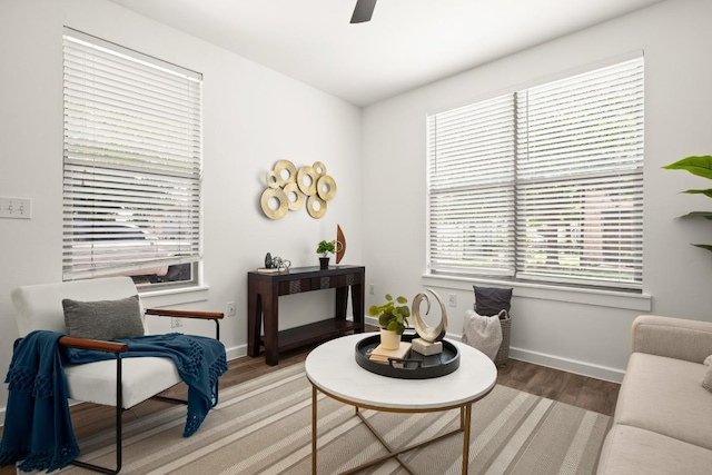 1201 Grove Blvd Unit 1103, Austin, TX 78741 - sitting room with light wood finished floors, baseboards, and ceiling fan