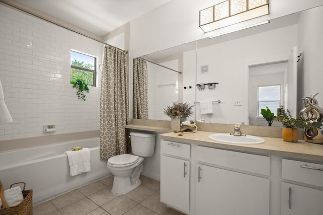 1201 Grove Blvd Unit 1103, Austin, TX 78741 - bathroom with vanity, toilet, shower / bathtub combination with curtain, tile patterned floors, and healthy amount of natural light