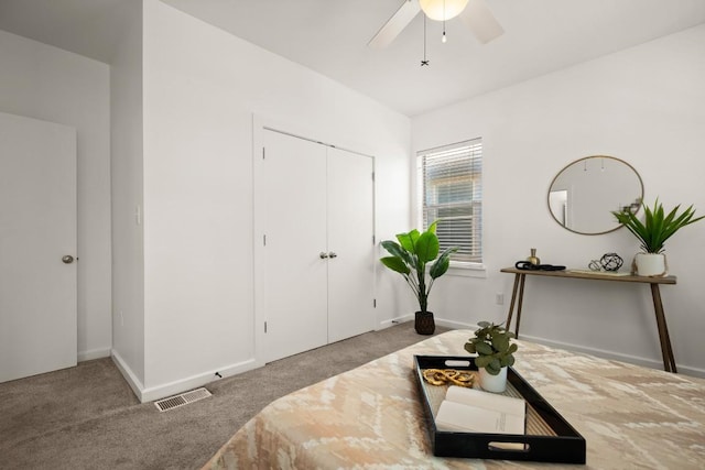 1201 Grove Blvd Unit 1103, Austin, TX 78741 - living area with carpet floors, ceiling fan, and baseboards