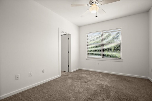 1201 Grove Blvd Unit 1103, Austin, TX 78741 - unfurnished room featuring carpet flooring, baseboards, and ceiling fan