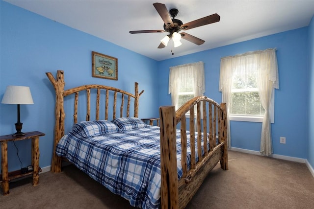 15055 Fm 32, Blanco, TX 78606 - bedroom featuring carpet flooring, baseboards, and ceiling fan