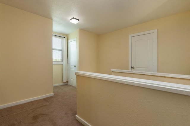 15055 Fm 32, Blanco, TX 78606 - hall with baseboards and light carpet