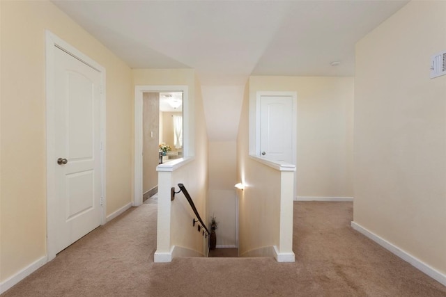 15055 Fm 32, Blanco, TX 78606 - corridor featuring an upstairs landing, carpet, and baseboards