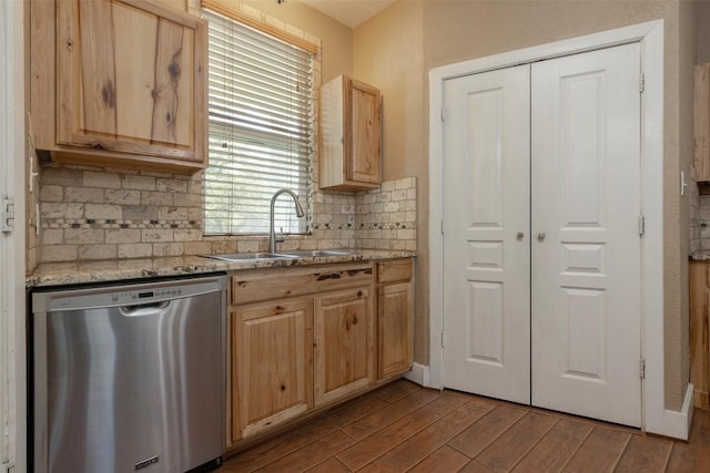 15055 Fm 32, Blanco, TX 78606 - kitchen featuring stainless steel dishwasher, a sink, light brown cabinets, and backsplash