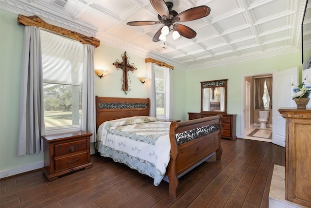 15055 Fm 32, Blanco, TX 78606 - bedroom featuring dark wood-style flooring, a ceiling fan, and baseboards