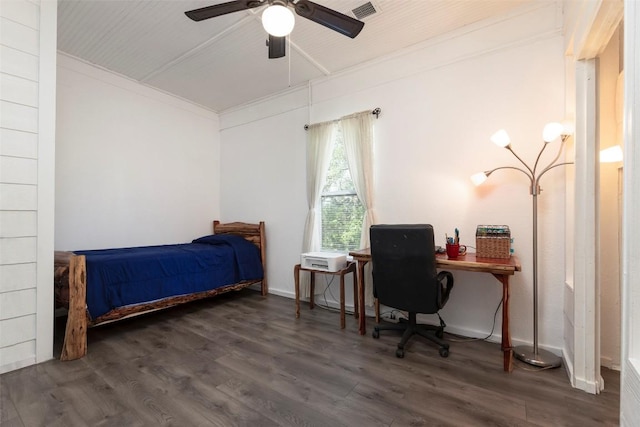 15055 Fm 32, Blanco, TX 78606 - bedroom with wood finished floors, a desk, and a ceiling fan