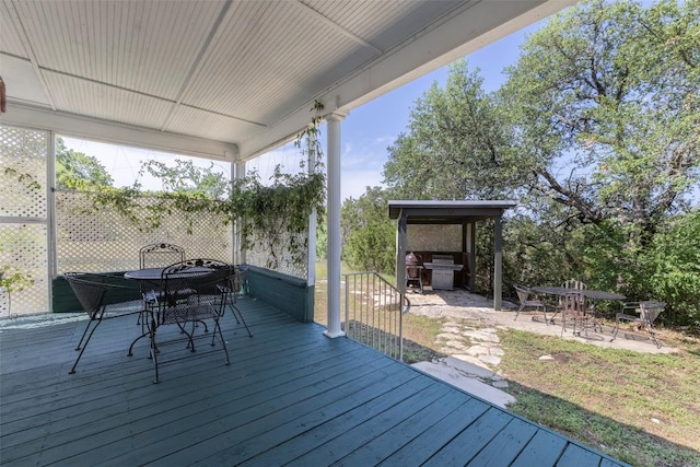 15055 Fm 32, Blanco, TX 78606 - wooden terrace with outdoor dining space