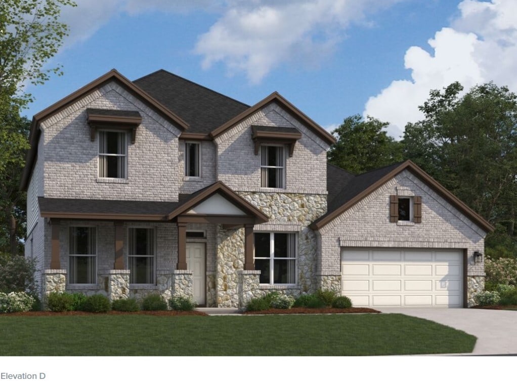 3969 Waco Way, Leander, TX 78641 - view of front of house featuring stone siding, a front lawn, concrete driveway, and an attached garage