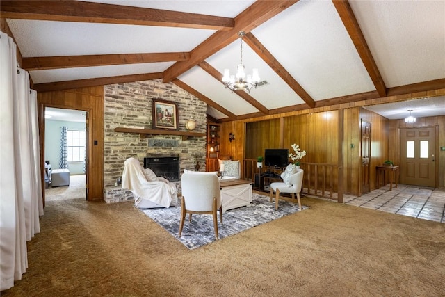 42 Laurel Hill St, Austin, TX 78737 - living room with wooden walls, carpet floors, a chandelier, and a brick fireplace