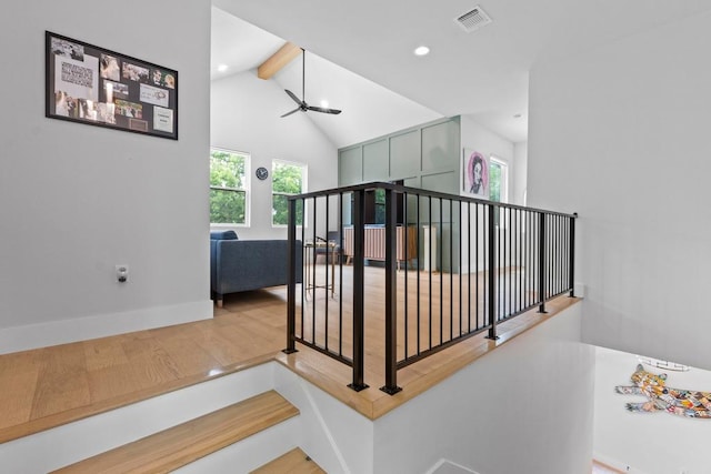 1708 Morrow St, Austin, TX 78757 - staircase featuring beamed ceiling, recessed lighting, wood finished floors, high vaulted ceiling, and baseboards