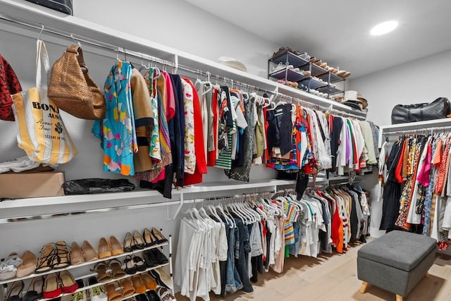 1708 Morrow St, Austin, TX 78757 - walk in closet with wood finished floors