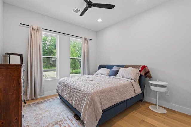 1708 Morrow St, Austin, TX 78757 - bedroom with wood finished floors, baseboards, a ceiling fan, and recessed lighting