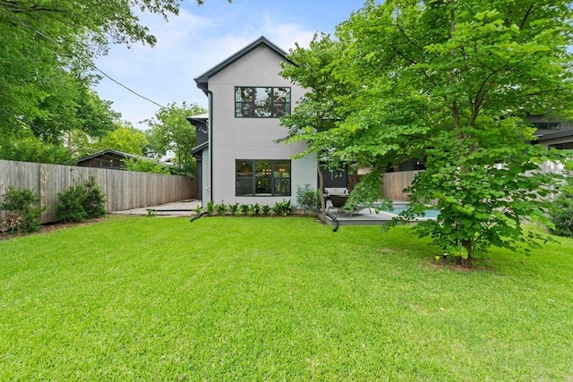 1708 Morrow St, Austin, TX 78757 - rear view of property featuring stucco siding
