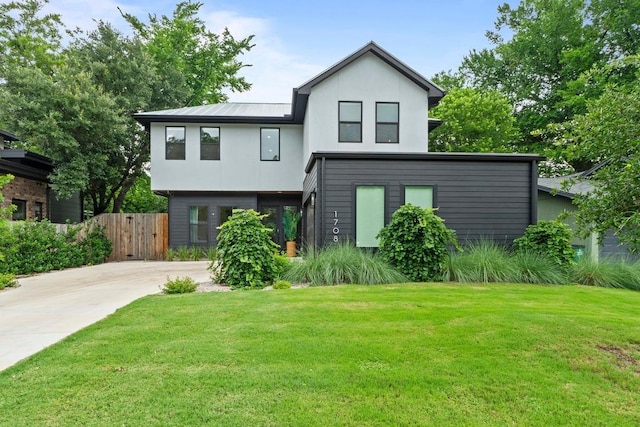 1708 Morrow St, Austin, TX 78757 - modern home featuring stucco siding and driveway