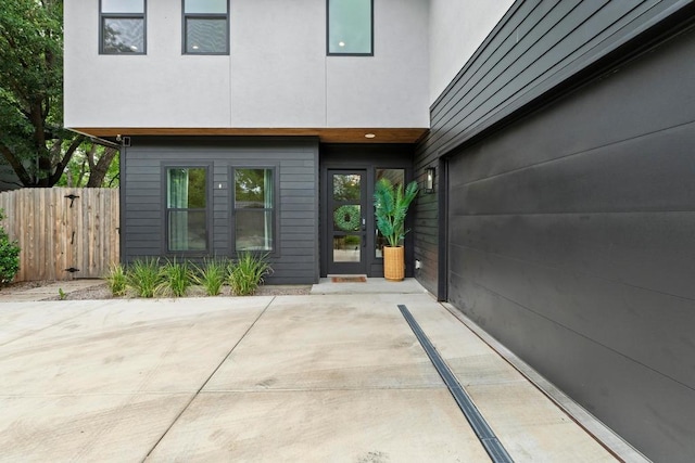 1708 Morrow St, Austin, TX 78757 - view of exterior entry featuring a patio and stucco siding