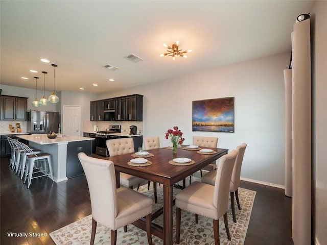 6900 Midlothian Dr, Austin, TX 78754 - dining area featuring dark wood-type flooring, recessed lighting, and baseboards