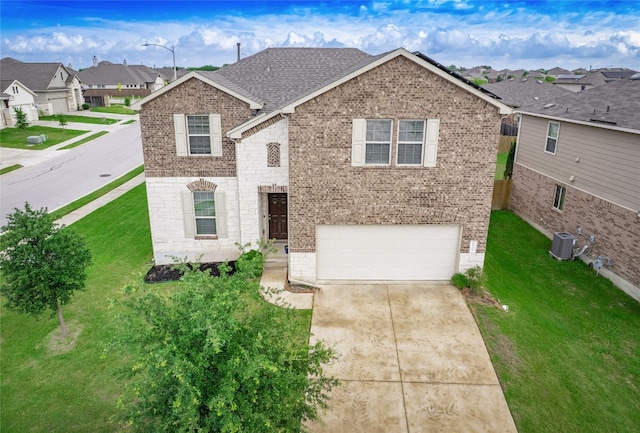6900 Midlothian Dr, Austin, TX 78754 - view of front facade with central air condition unit, brick siding, a garage, driveway, and a residential view