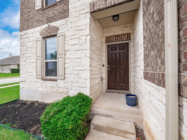 6900 Midlothian Dr, Austin, TX 78754 - property entrance with stone siding and brick siding