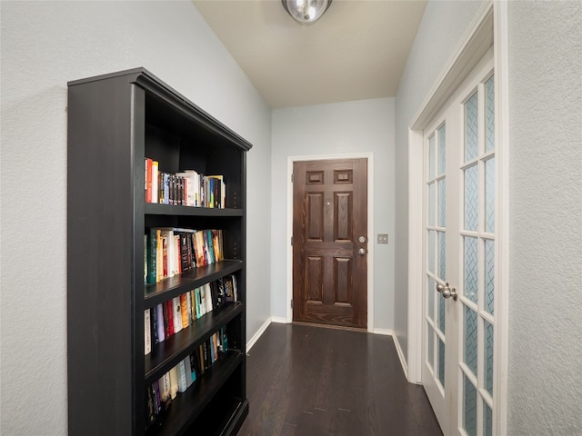 6900 Midlothian Dr, Austin, TX 78754 - entrance foyer featuring dark wood-type flooring and baseboards