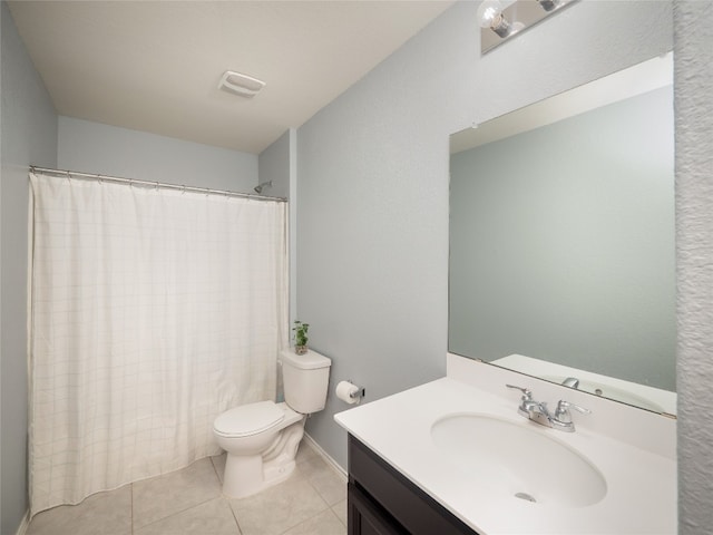 6900 Midlothian Dr, Austin, TX 78754 - bathroom with toilet, vanity, tile patterned flooring, and a shower with curtain