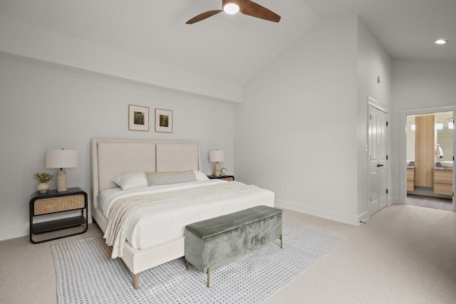 1002 Payne Ave, Austin, TX 78757 - bedroom with light colored carpet, baseboards, vaulted ceiling, ensuite bathroom, and ceiling fan