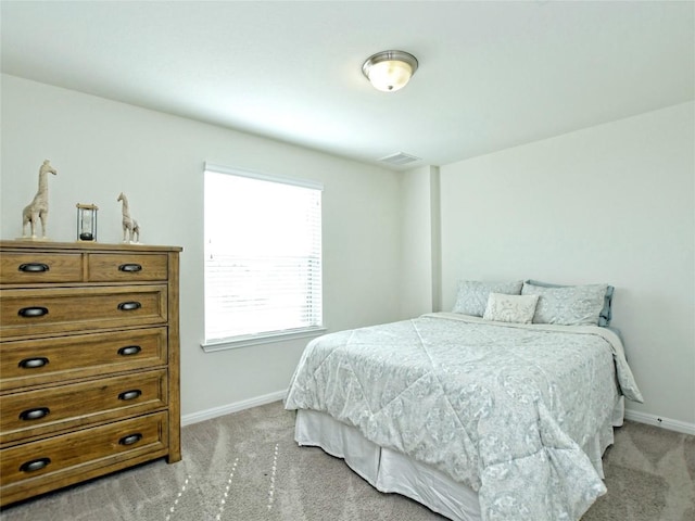 913 Swan Flower St, Leander, TX 78641 - bedroom with baseboards and light carpet